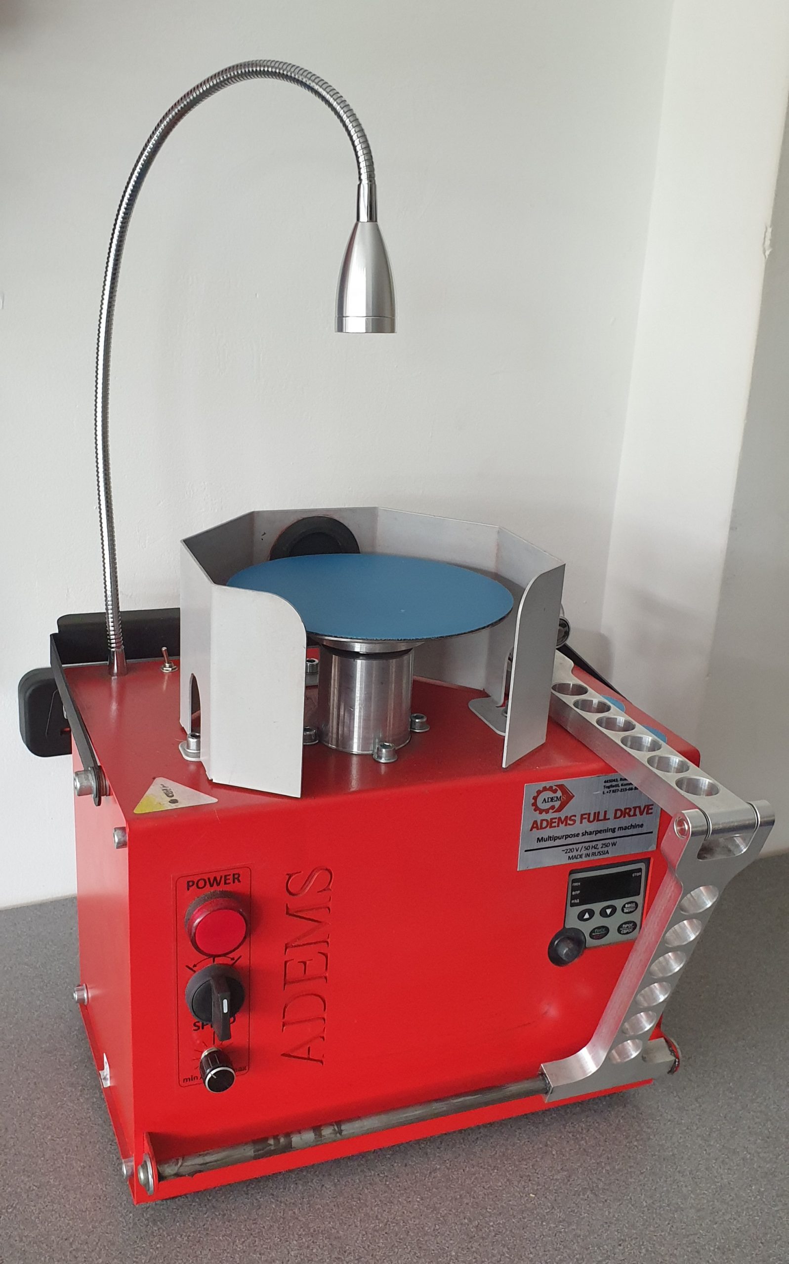 ADEMS Full Drive - machine for sharpening of hairdressing instruments